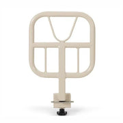Beige metal grid-like object on a white background