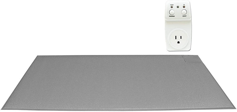 Gray heating pad with a white power outlet on a white background