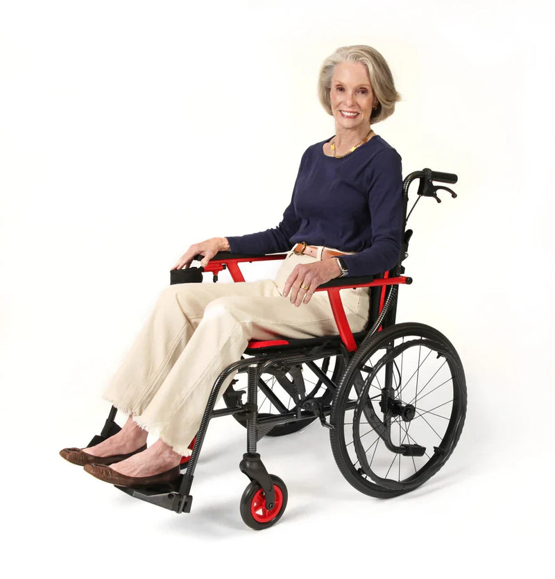 Woman sitting in a wheelchair with red accents on a white background