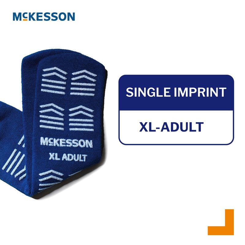 Blue McKesson XL adult medical compression stocking with branding and size label on a white background