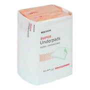 Box of McKesson Super Underpads on a white background