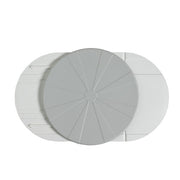 Round gray object with a central cutout on a white background