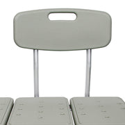 Close-up of a gray plastic chair with a backrest on a white background