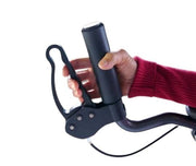 Hand holding a black bicycle handlebar against a white background