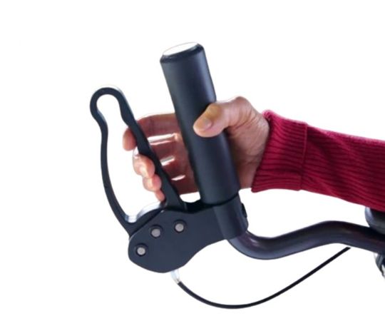 Hand holding a black bicycle handlebar against a white background