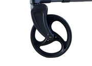 Close-up of a black scooter wheel on a white background