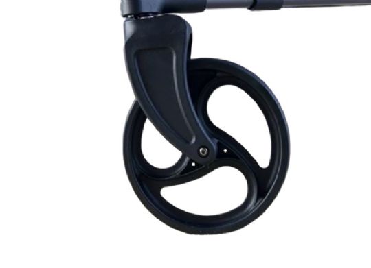 Close-up of a black scooter wheel on a white background