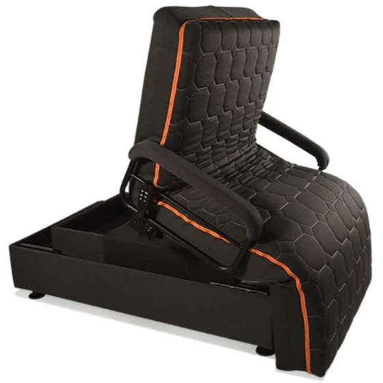 Black quilted upbed with orange accents on a white background
