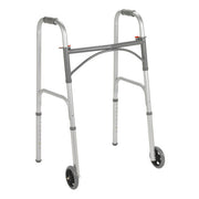 Silver walker with wheels on a white background
