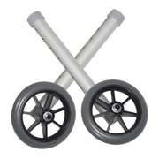 Two crossed metal bars with wheels on a white background