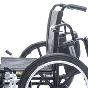 Close-up of a black wheelchair on a white background