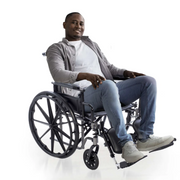 Man in a wheelchair on a white background
